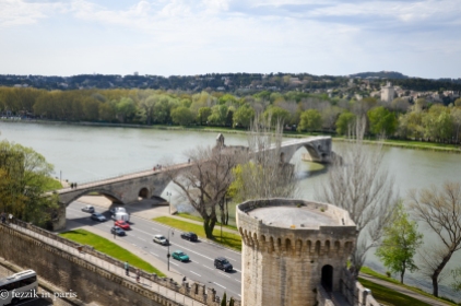 The remains of Pont Saint-Bénézet, as seen from atop the Avignon wall. The bridge originally terminated at the tower seen in the background.
