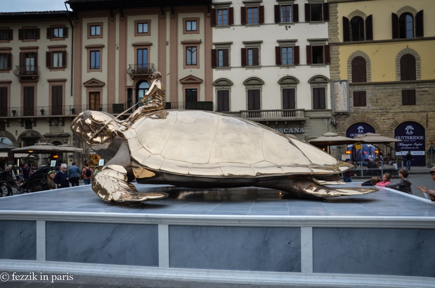 As I didn't see it anywhere else, I think this turtle is sitting on the plaque that denotes where Savonarola was burned.